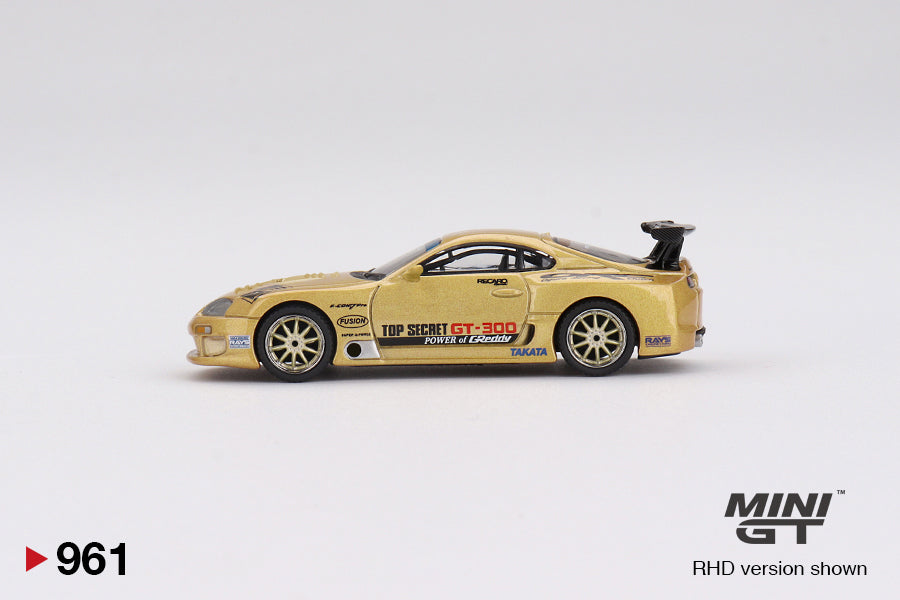 Toyota Supra (A80) Top Secret GT-300 Top Secret Gold 1:64 scale model car - Mini GT