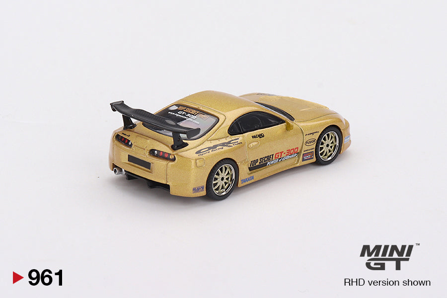 Toyota Supra (A80) Top Secret GT-300 Top Secret Gold 1:64 scale model car - Mini GT